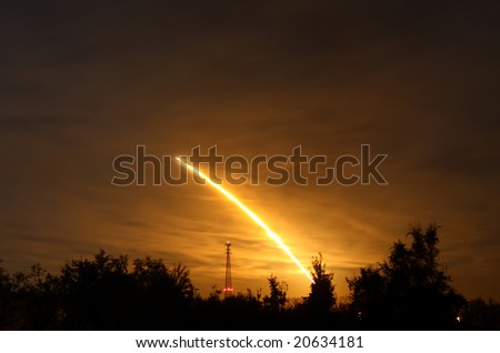 CAPE CANAVERAL, FL OCTOBER 14: Flame trail of Space Shuttle Endeavour as it launches successfully from Cape Canaveral at 08:09:23 PM EST.