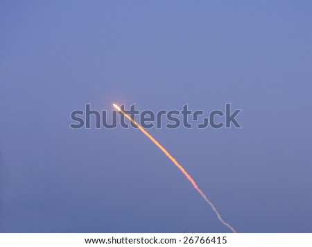 CAPE CANAVERAL, FL - March 15: Vapor trail of Space Shuttle Discovery as it launches successfully from Cape Canaveral at 7:43 PM EST.