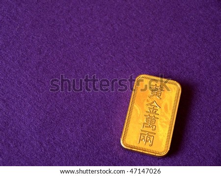 Chinese Gold Plate on violet velvet background (in 990000 Tael) with space for design