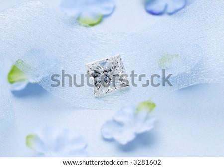 Square Diamond with silk flowers on blue