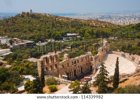 Herodes theater of the Acropolis in Athens with the city of Athens at background