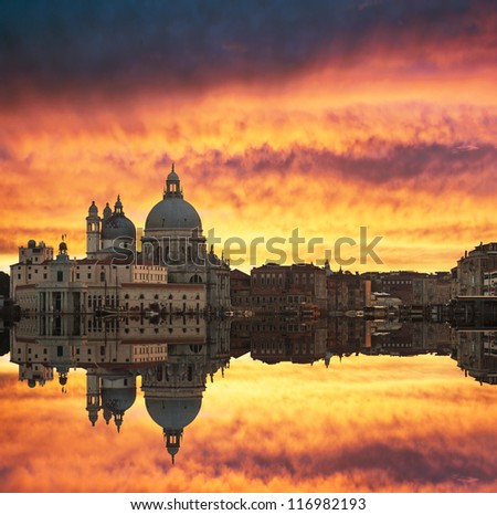 Gorgeous sunset over Grand Canal and Basilica Santa Maria della Salute with beautiful reflections Venice Italy Gorgeous sunset over Grand Canal and Basilica Santa Maria della Salute with beautiful reflections Venice Italy
