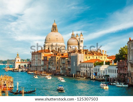 Gorgeous View Of The Grand Canal And Basilica Santa Maria Della Salute During Sunset With Interesting Clouds, Venice, Italy