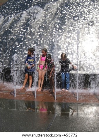 Girls Cooling Off at Seattle Center\'s Musical Water Fountain