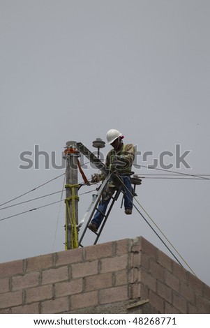 LA LIBERTAD, EL SALVADOR - FEB 25: Power is gone for over 8 hours, when a long section of lines need to be replaced for corrosion on Feb 25, 2010 in La Libertad, El Salvador.