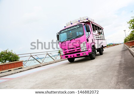 PHUKET - MAY 31: Bus on Chalong Pier that take tourists to fishing and diving boats on May 31, 2013 in Phuket, Thailand. The pier, also known as Ao Chalong, is the main pier in the area.