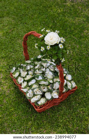 Basket of flower petals to throw at a wedding ceremony.