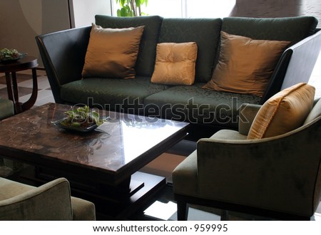 Sofas, chairs and a table in a living room