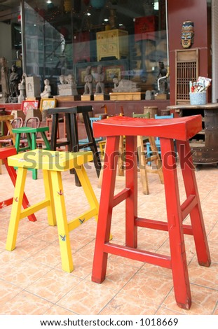 Colorful wooden chairs in Itaewon shopping area, Seoul, South Korea