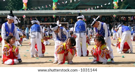 Korean school children performing a traditional dance
