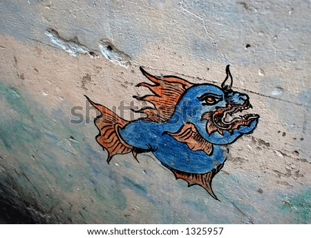 Blue dragon fish graffiti - street art