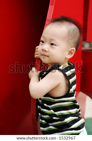 Men stock photo : Cute Asian baby with a mohawk hairstyle
