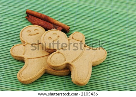 Ginger bread men with cinnamon sticks