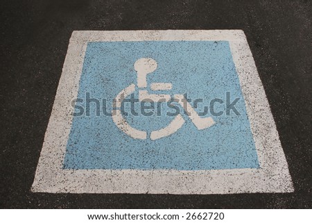 Wheelchair access sign on the ground