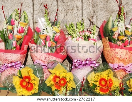 Bunches of pretty pink and yellow flowers