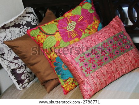 Brightly colored pillows on a sofa - home interiors