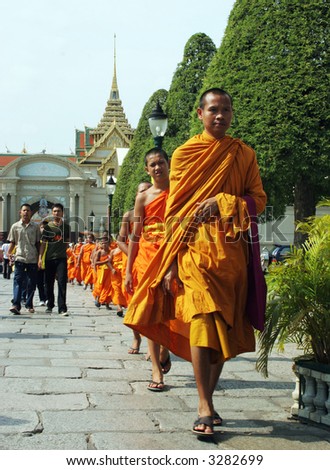 Monks at a temple in Thailand - travel and tourism