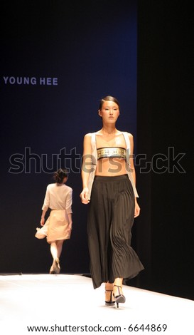 Model walking the catwalk at Seoul Collection (Fashion Week) 08 S/S. Lee Young-hee collection. EDITORIAL ONLY.