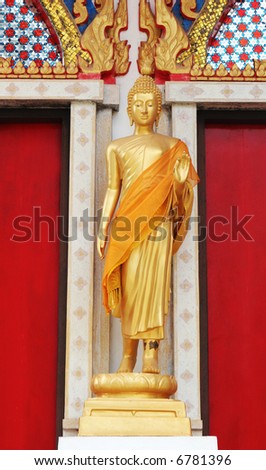 Buddhist statue at Wat Ladthiwanaram in Chalong, Phuket, Thailand - travel and tourism.