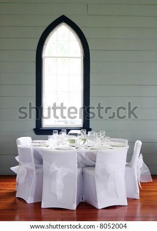 stock photo Tables decorated at a wedding reception held in a church hall