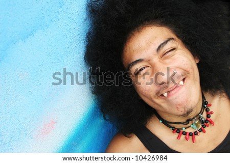 Afro Hair Cuts on Stock Photo Thai Man With A Big Afro Hairstyle And Fang Teeth