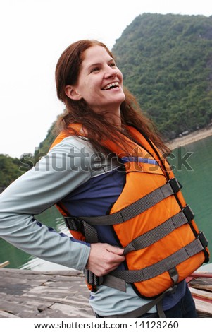 Portrait of a woman in a life jacket - health and fitness.