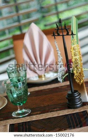Elegant table setting in a Thai restaurant.