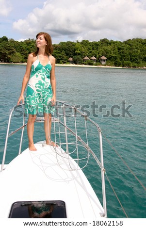 Beautiful woman on board a luxury boat charter.