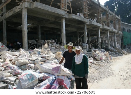 PHI PHI ISLAND - DECEMBER 3: Burmese workers at a construction site on December 3, 2008 on Phi Phi Island, Thailand.