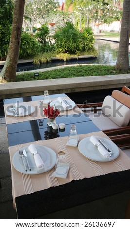 Elegant table setting for four - fine dining.