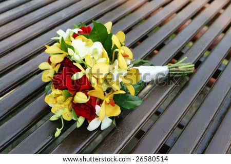 Wedding bouquet made of gorgeous tropical flowers.
