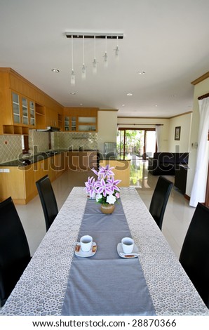 Dining room of a modern house - home interiors.