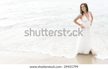 Gorgeous bride on the beach - tropical destination wedding.