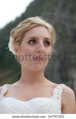 Beautiful bride getting married at the beach.
