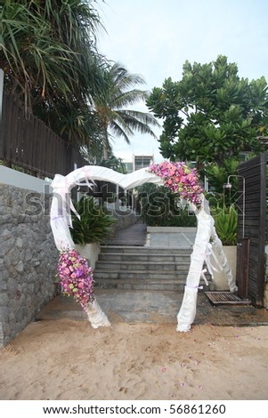 stock photo Floral archway at a wedding ceremony on the beach