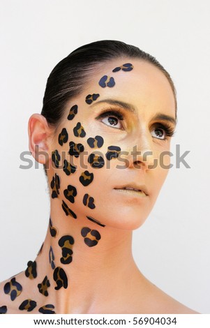stock photo High fashion portrait of a woman with leopard print makeup