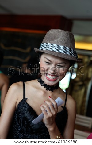PHUKET - SEPTEMBER 12: Guests at Passion for Fashion, a show in aid of the children\'s charity Phuket Has Been Good To Us Foundation on September 12, 2010 in Phuket, Thailand.