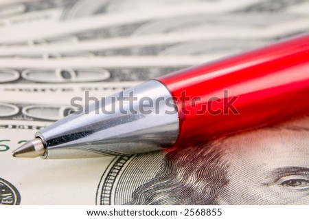 the red pen macro on dollar background