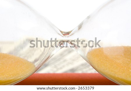 the brown hour-glass on background from US dollars