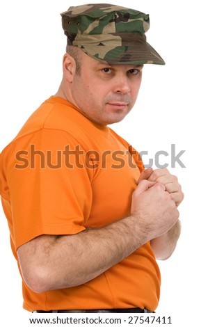 serious man in orange t-shirt on a white background