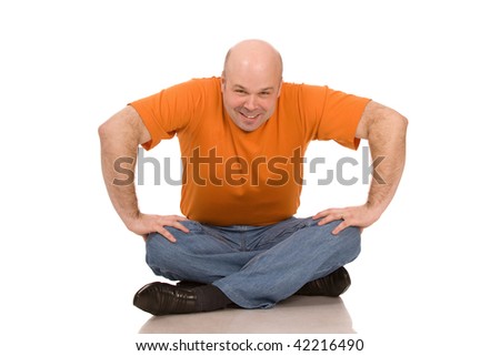 serious man in orange t-shirt on a white background