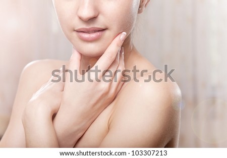 Perfect skin concept. Portrait of beautiful girl over light background
