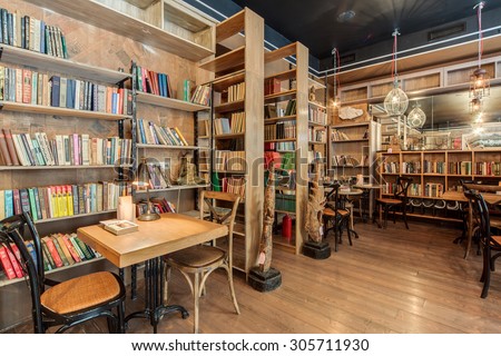 Saint Petersburg, Russia - July 9 2014. \
The cozy restaurant-library in the city center. The restaurant\'s name in Russian is a play on words. You can read \