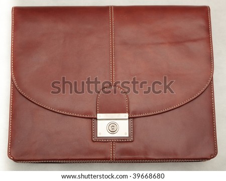 Fashionable men\'s portfolio. Leather portfolio. Isolated object on a white background.
