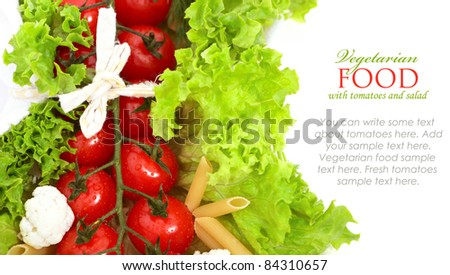 Fresh tomatoes wrapped with green leaves of lettuce salad isolated on white background