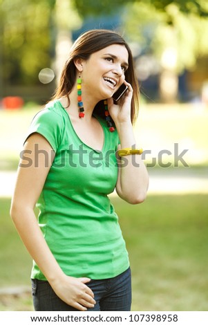 Beautiful woman talking on the mobile phone