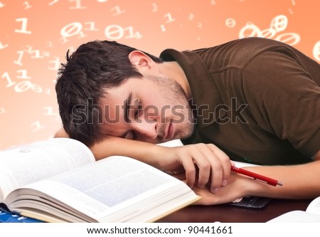 Sleeping student dreaming numbers lying over books