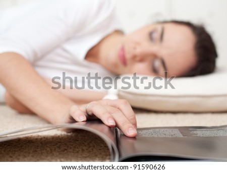 Young girl fallen a sleep as she read a book