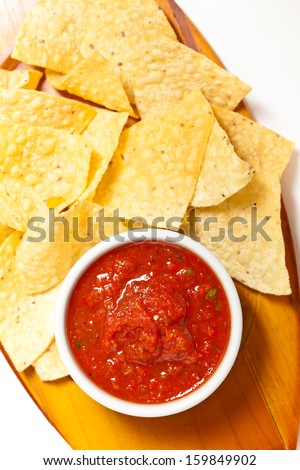 Spicy red salsa with tortilla chips