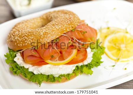 Cream cheese and smoked salmon bagel. Selective focus.